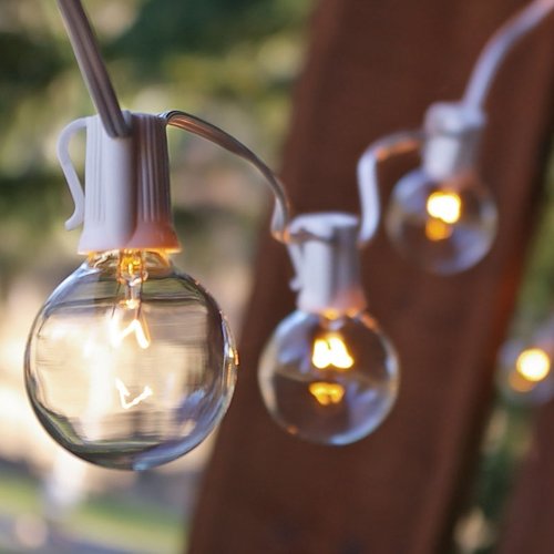 Spring Rose(TM) 25 Clear Patio String Globe Lights With White Cord. These Are Great For Holidays, Christmas and Should Be Part of Your Wedding Supplies. They Make A Great Party Decoration And Can Be Used Outdoors and Indoors. Each Strand Has 25 Round Clear Bulbs(Plus 2 Extra Bulbs) With A Female End So You Can Connect Multiple Sets. Every Socket Has A Clip For Easy Installation. Total Length 25 Feet, 12 Inch Spacing Between Bulbs, and 5 Inches From First Bulb To Plug.