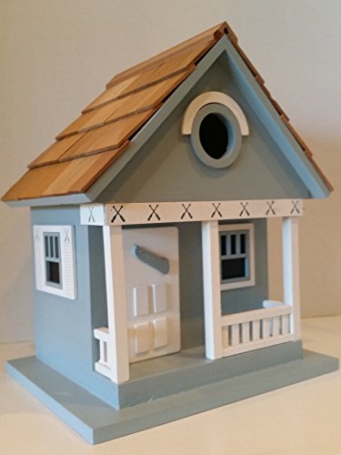Blue Lake Cottage Birdhouse is a Whimsical and Peaceful Lakefront Blue Cottage that is a fully functional Outdoor Wood Birdhouse